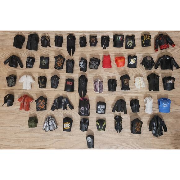 Lot Of 54 WWE Mattel AEW Jaswares Rubber Shirts and Vests Loose Accessories NXT
